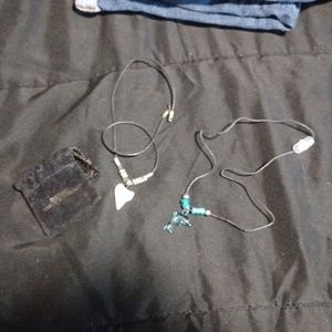 Shark tooth and Dolphin necklaces with pouch